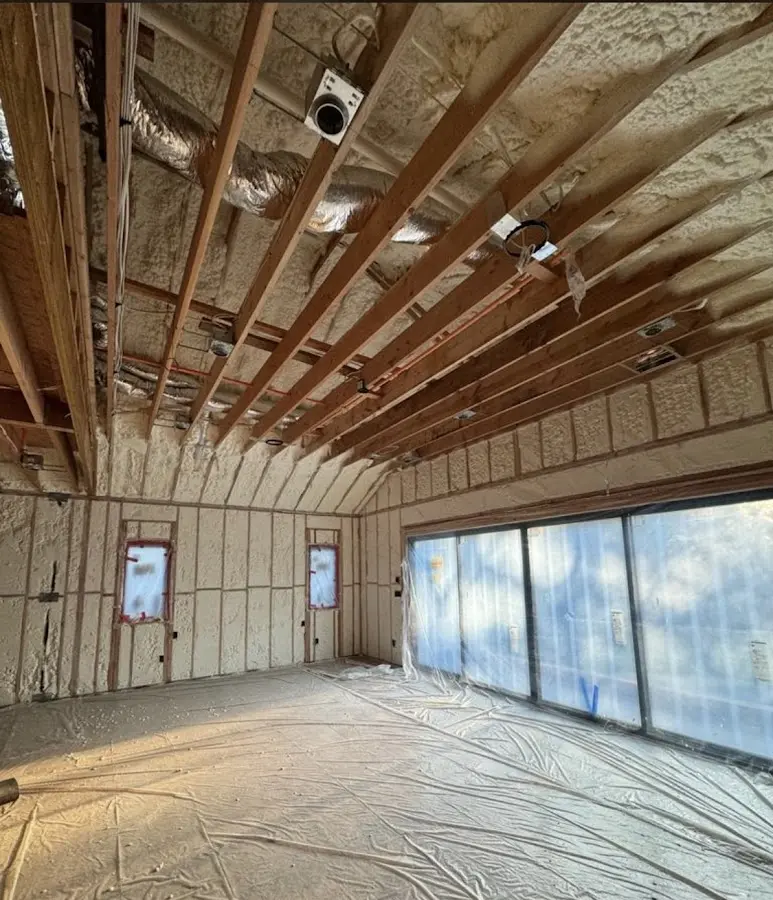 Interior walls and ceiling insulated with spray foam during new construction in Thomas